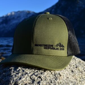 Front of a Northern Republic Green and Black Snap Back Hat